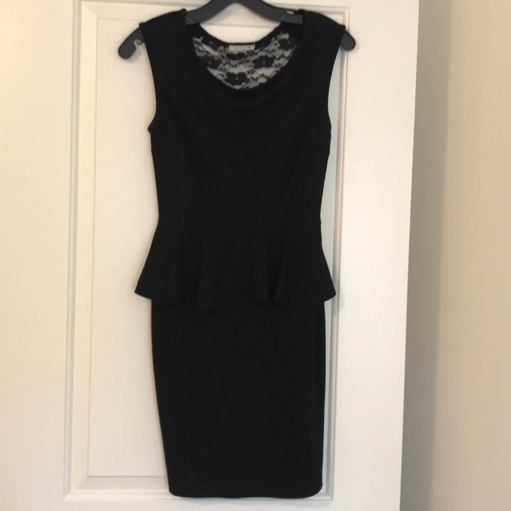 Lace back peplum style dress